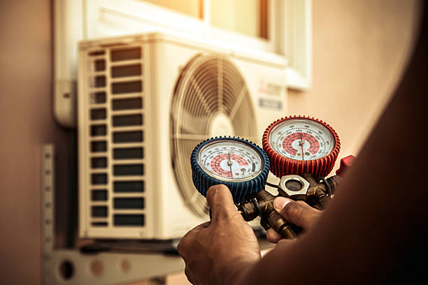 Professional Hvac technician working in Farmingville, NY